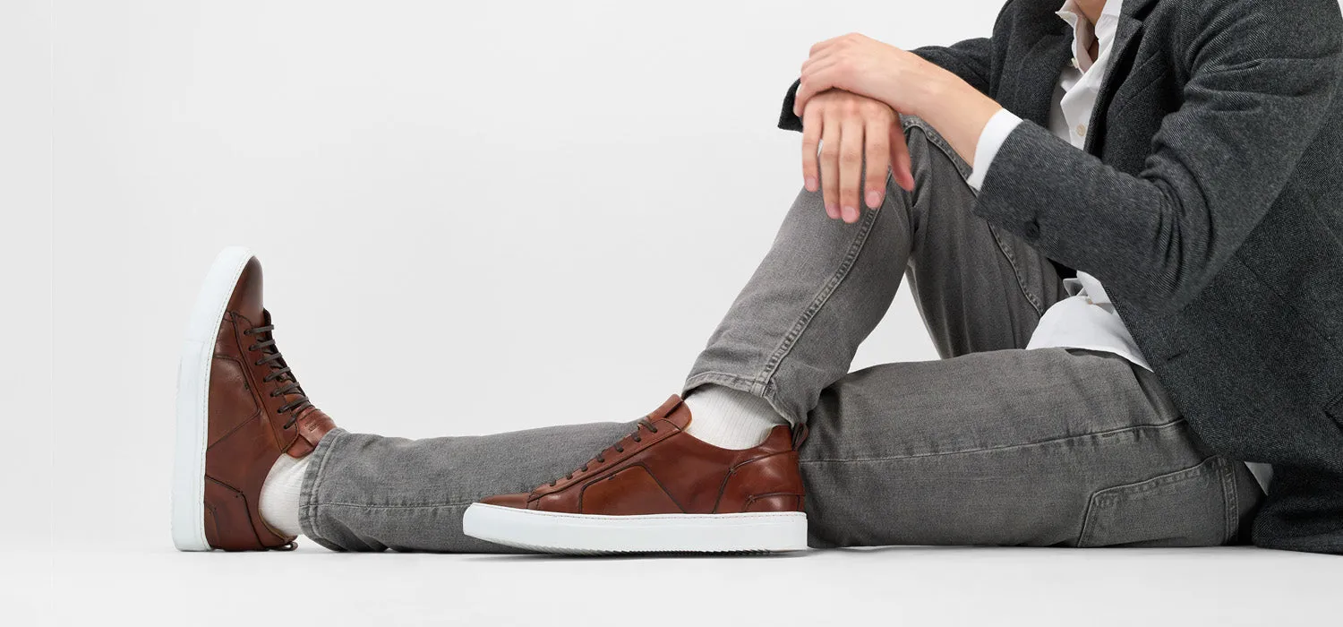 SKYE cognac folded patina sneakers.
